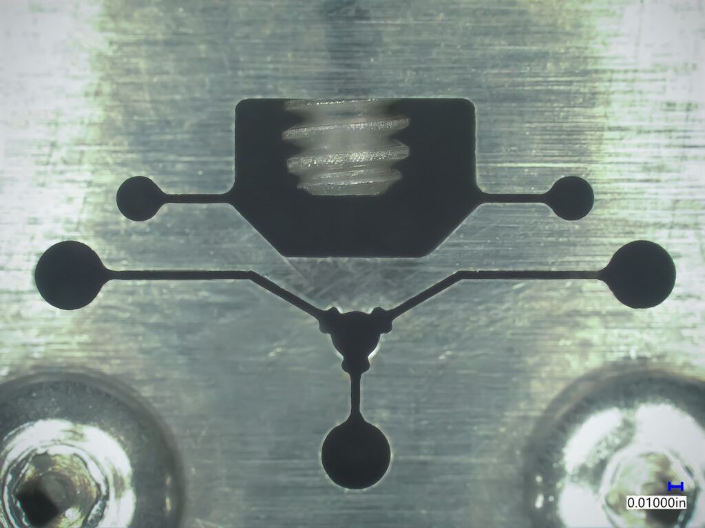 Inside the high precision fixture used in the machine process of the Nano Nozzle